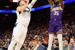 九游体育- 东契奇迎来七赛季出色发挥，德国队观众热烈欢呼！赢得满堂喝彩